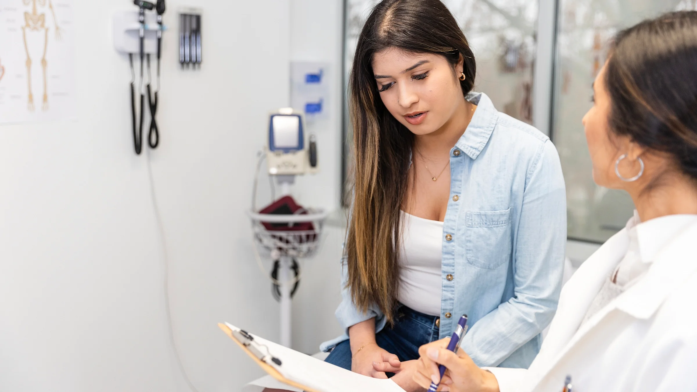 A teenage girl at a medical appointment.