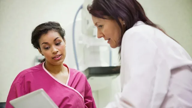 Health: Gynecology: doctor showing tablet 1430860687