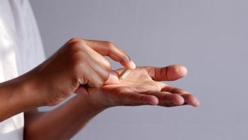 Medication Education: closeup pill in hand 1412349154