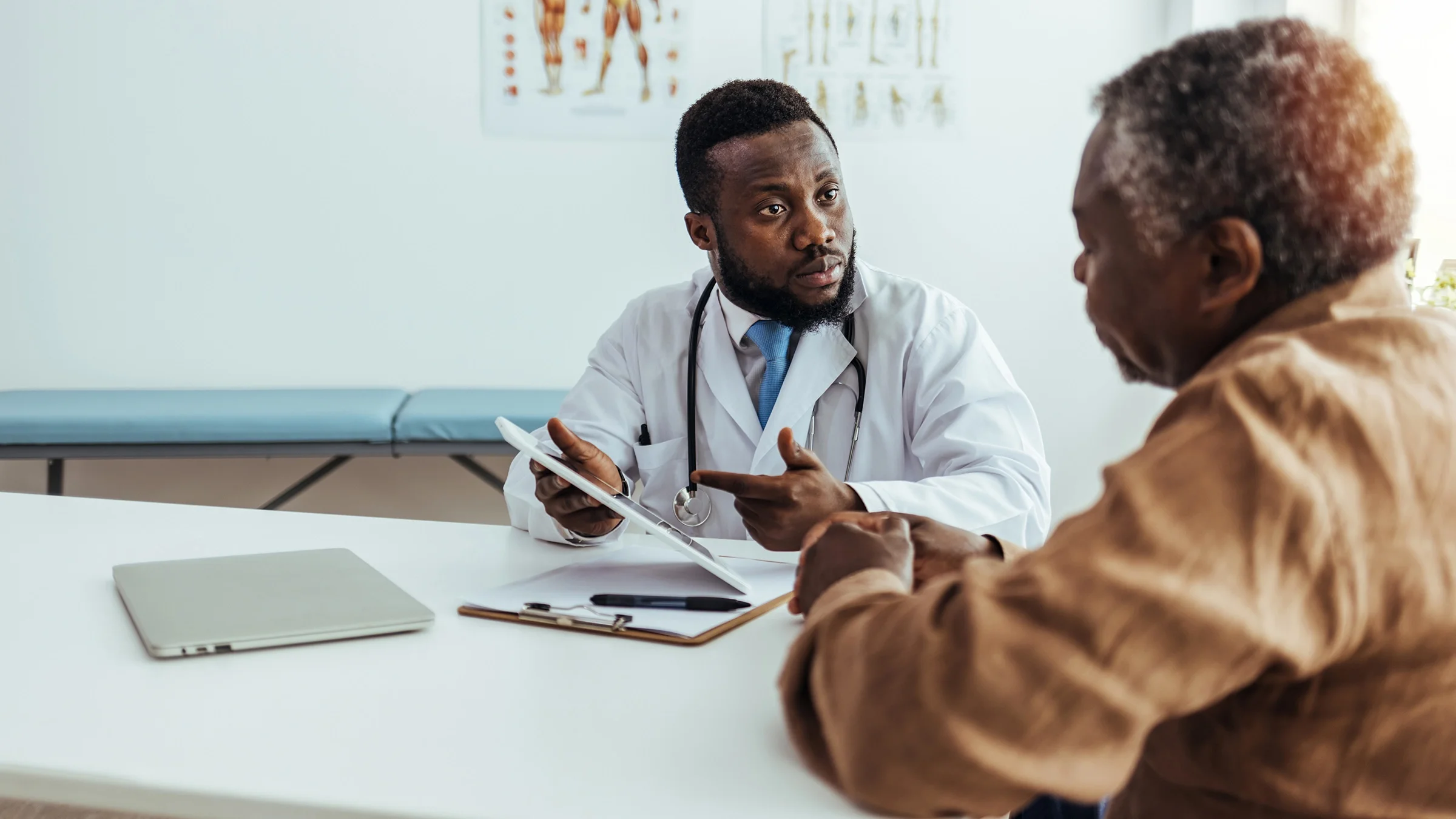 A doctor discusses options with a patient.
