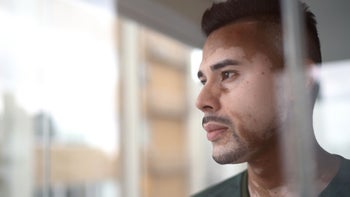 bpd: therapy: serious man staring out window 1299473860