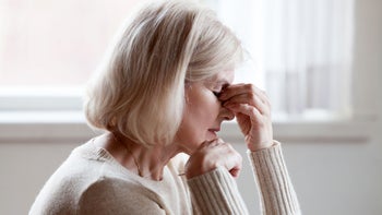 Health: Migraine: senior woman headache 1049512696