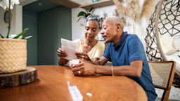 A couple reads medication instructions together.
andreswd/E+ via Getty Images
