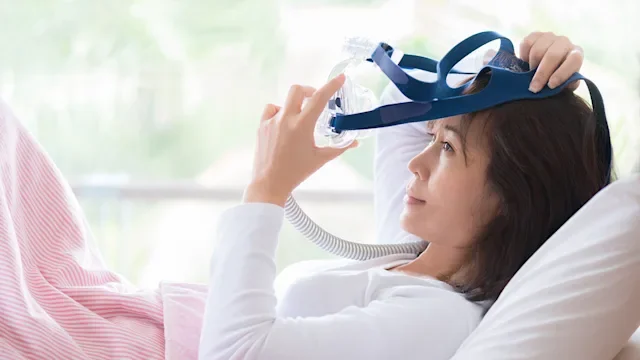 Medical supplies and devices: CPAP: cpap machine woman-614856072