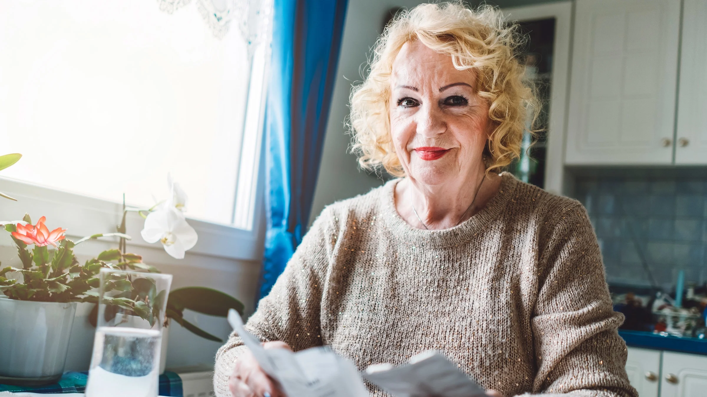 A senior adult reading medication instructions.