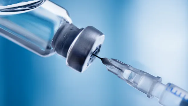 insulins: closeup vial and syringe 1446086134