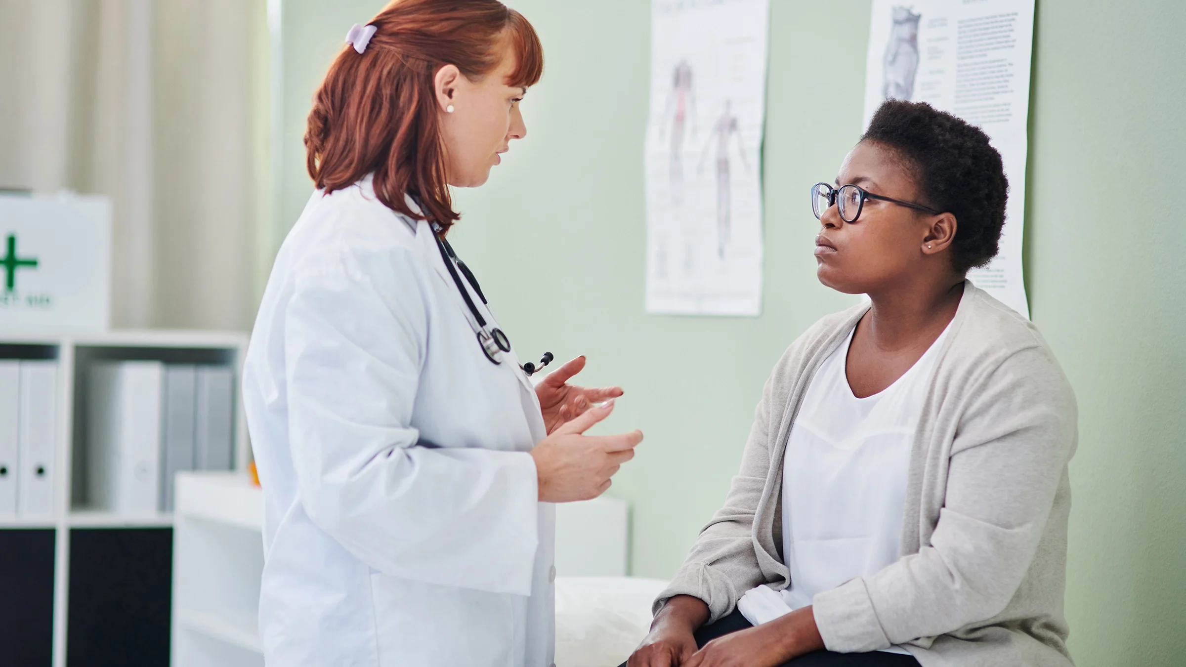 A doctor has a consultation with a patient.