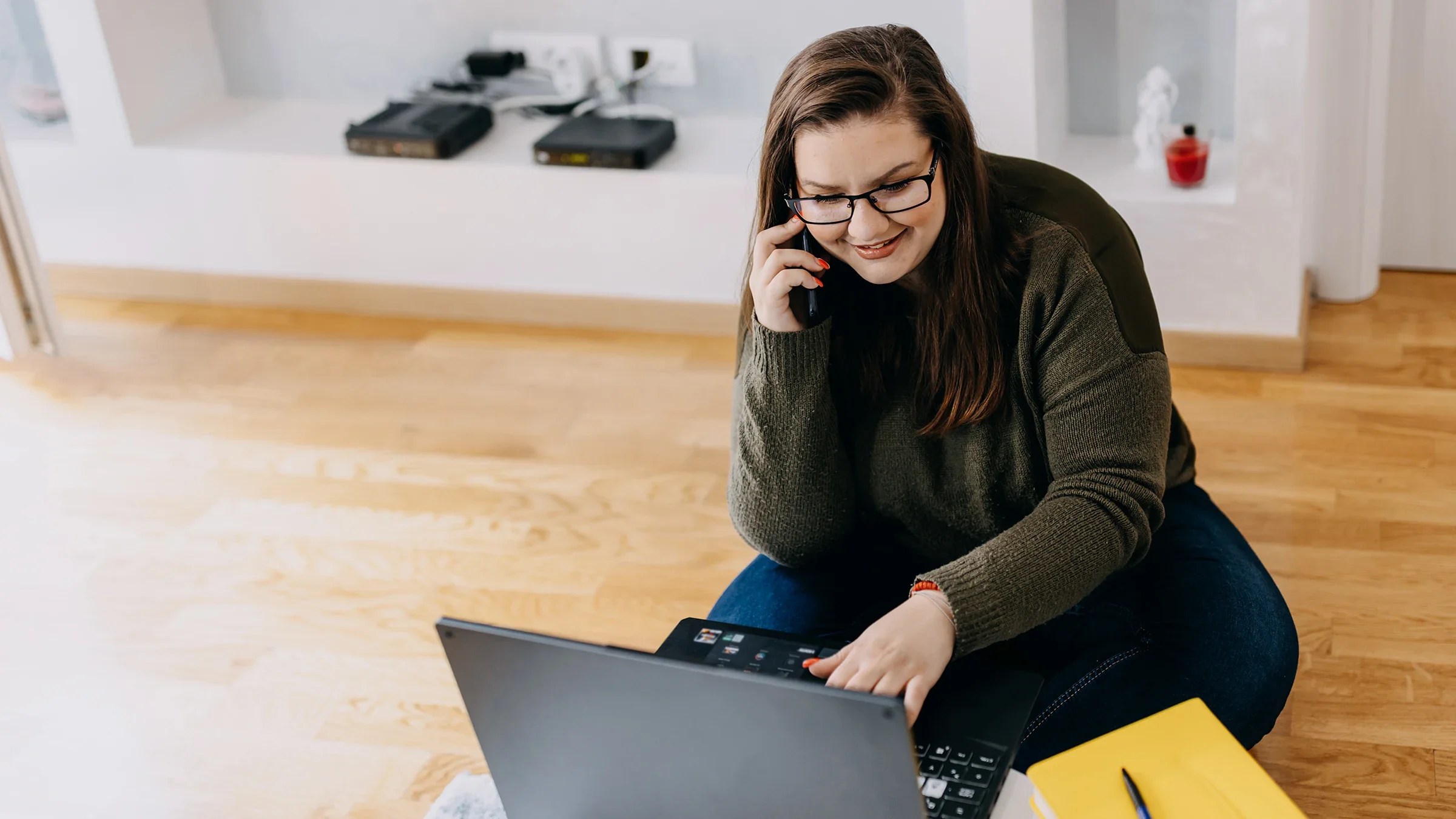 Woman talking on the phone and using laptop
RealPeopleGroup/E+ via Getty Images