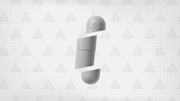Light gray background with texture and warning sign pattern. In the middle is a white-gray capsule pill cut into thirds.
GoodRx Health