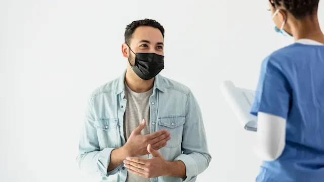 Personal finance: Vasectomy cost: young man doctor consult 1318003136