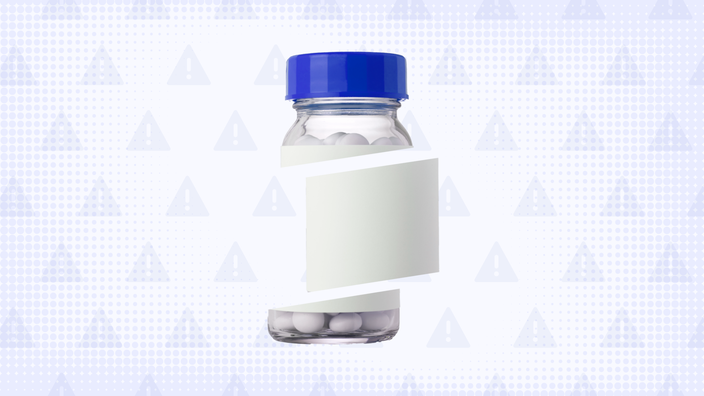 Light blue-purple background with texture and warning sign pattern. In the center is a clear pill bottle with a blue top cut into thirds. 