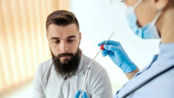 medicare: medical professional preps for swab test 1941888694