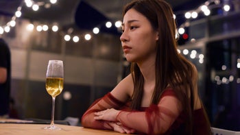 Alcohol: Depression: sad next to wine glass 1372514466