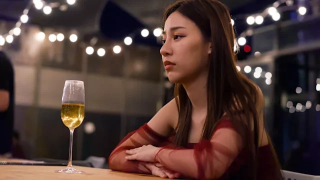 Alcohol: Depression: sad next to wine glass 1372514466