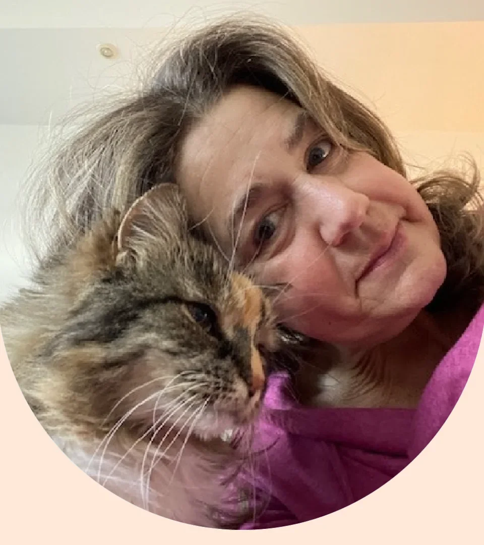Nell McCaslin is pictured with her cat, Gracie.