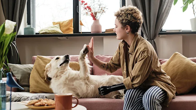 dog: woman resting with golden retriever 1389482130