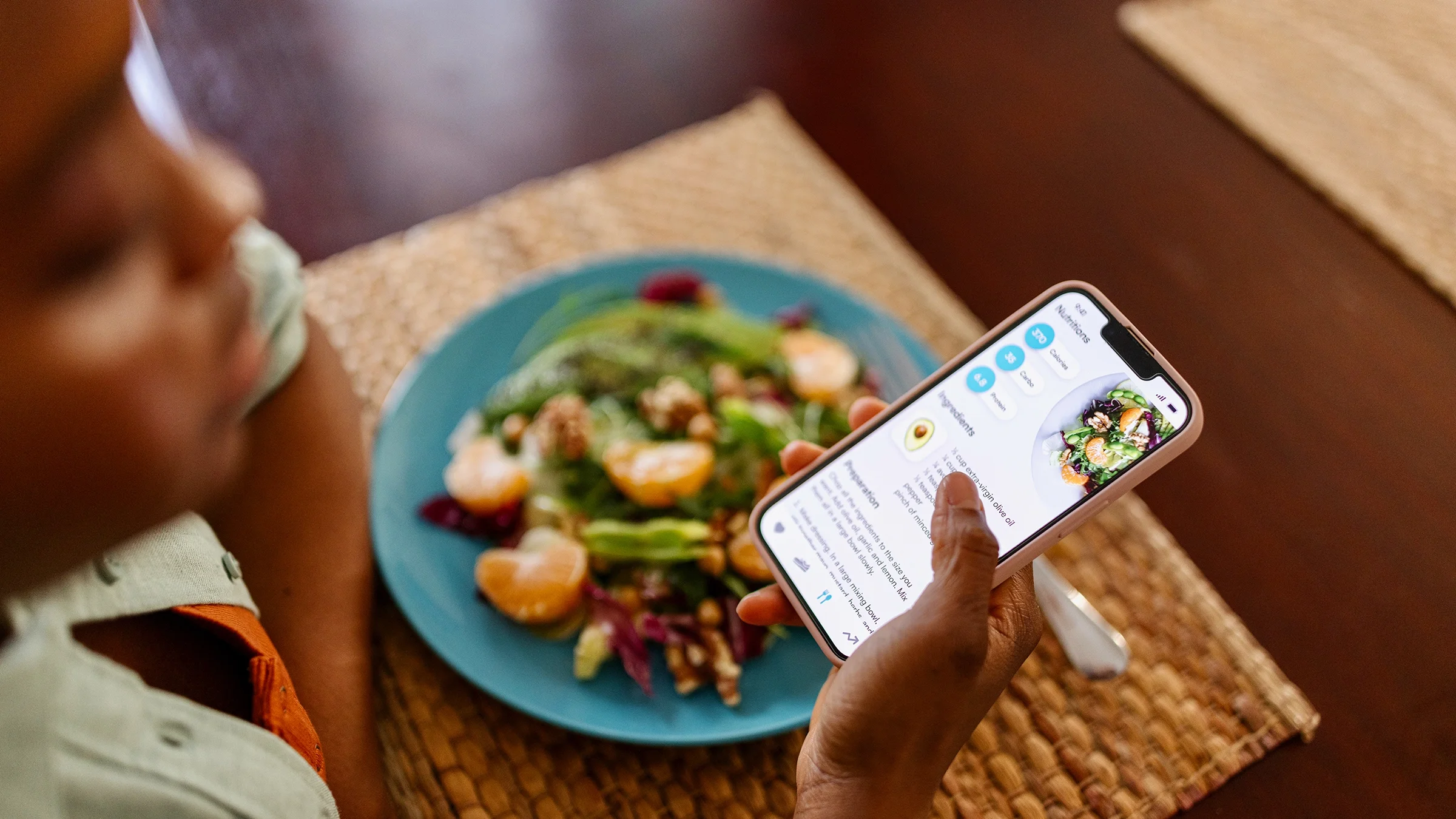 Person tracking calories on a mobile app.