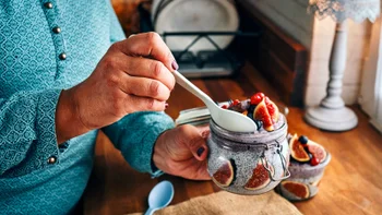 weight loss: closeup yogurt with chia seeds and fruit 1049469656