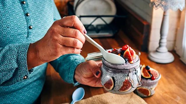 weight loss: closeup yogurt with chia seeds and fruit 1049469656