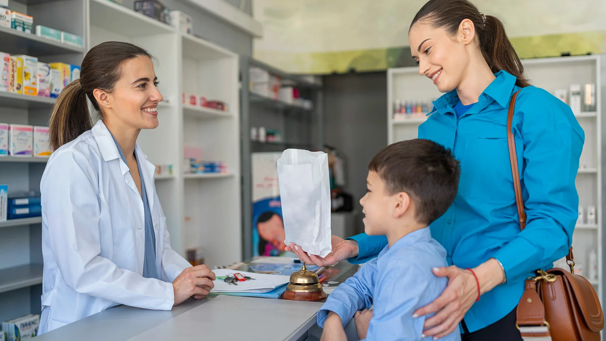 A healthcare professional and a woman are looking at a medication label together.
valentinrussanov/E+ via Getty Images
