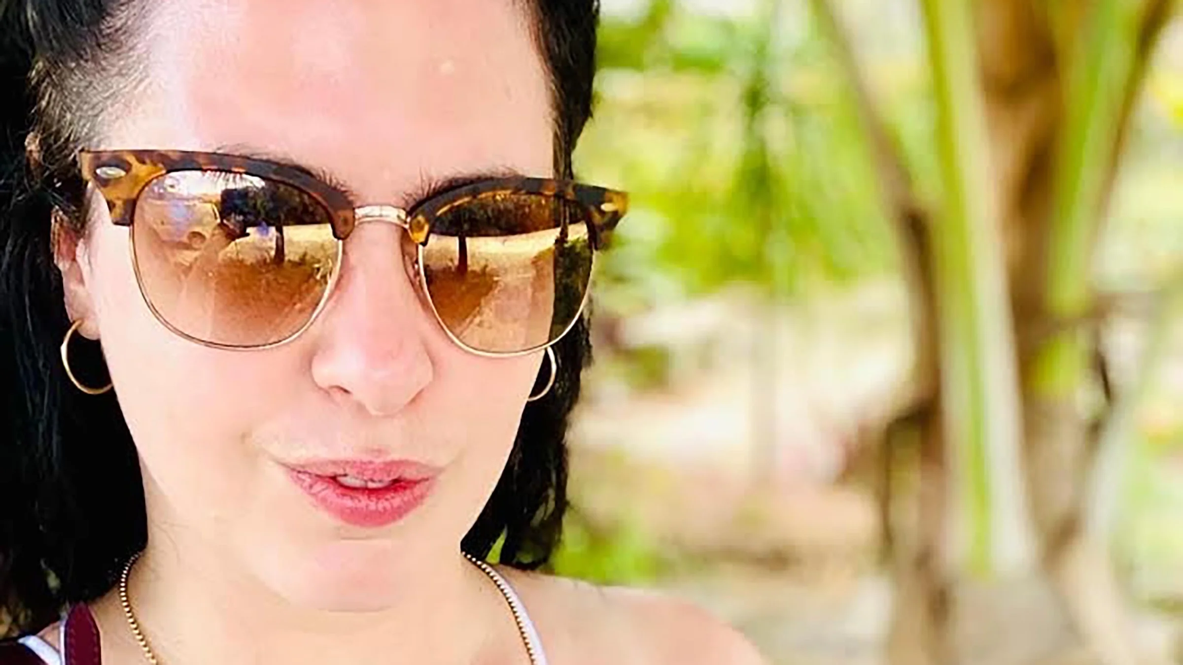 Image of Lisa Marie Basile wearing sunglasses.