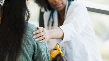 Postpartum Depression: Parenthood: Women's Health: doctor consoling new mom 1361756866