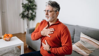 Musculoskeletal: man doing deep breathing 1466041945