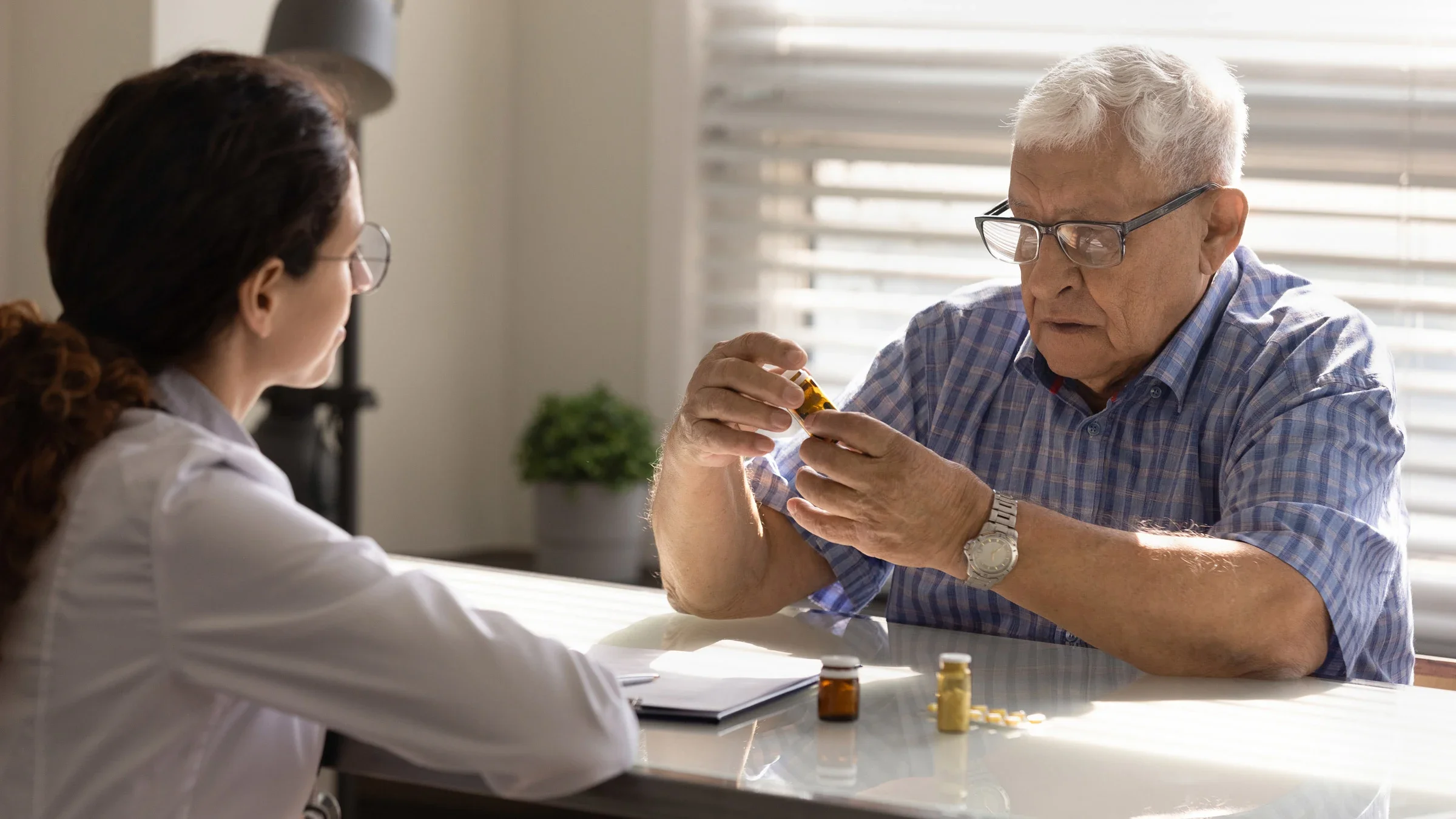 Atrial fibrillation: doctor patient discussing different meds 1319103317