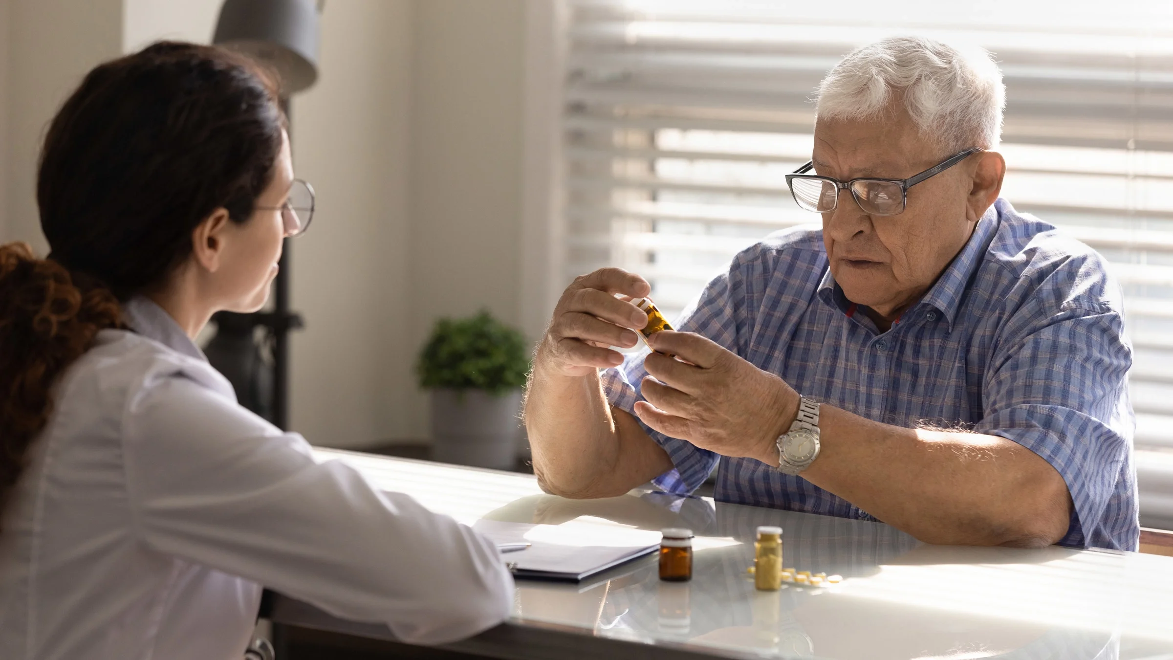 A doctor and patient discussing different medications.