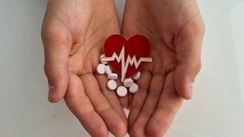 Heart failure: heart pin pills in hands-1410321698