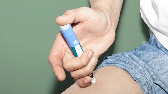 ozempic: closeup insulin injection in thigh 1499754635