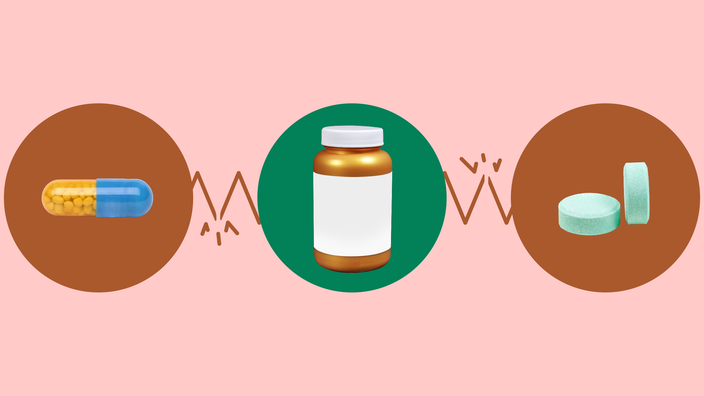 Light-red background with three circles across the middle of the frame. In the center, on a green circle, is a gold supplement bottle. On the left, on a red circle, is a yellow-and-blue capsule pill. On the right, on a red circle, are teal antacid pills. The circles are connected with emphasis lines. 