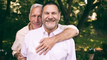 Health: LGBTQ: couple posing for portrait outside-973370780
