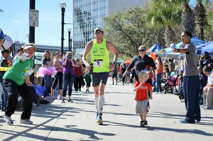 Paul Wilson is pictured running in a race.