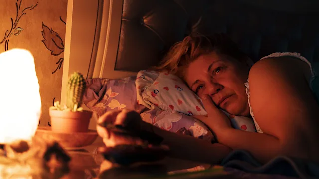Health: Trazodone: woman restless in bed 1317475673
