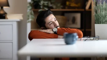 man staring out the window 2246543925