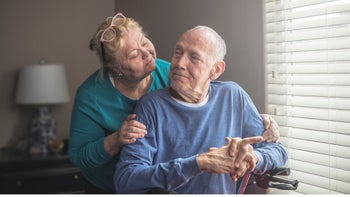parkinsons-disease: portrait senior couple at home-1201091089
