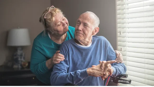 parkinsons-disease: portrait senior couple at home-1201091089