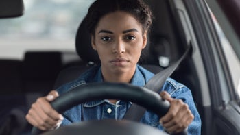 Health: dayquil: woman driving zoning out 1305330894
