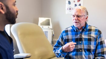 Erectile dysfunction:  man at medical appointment 2206425856