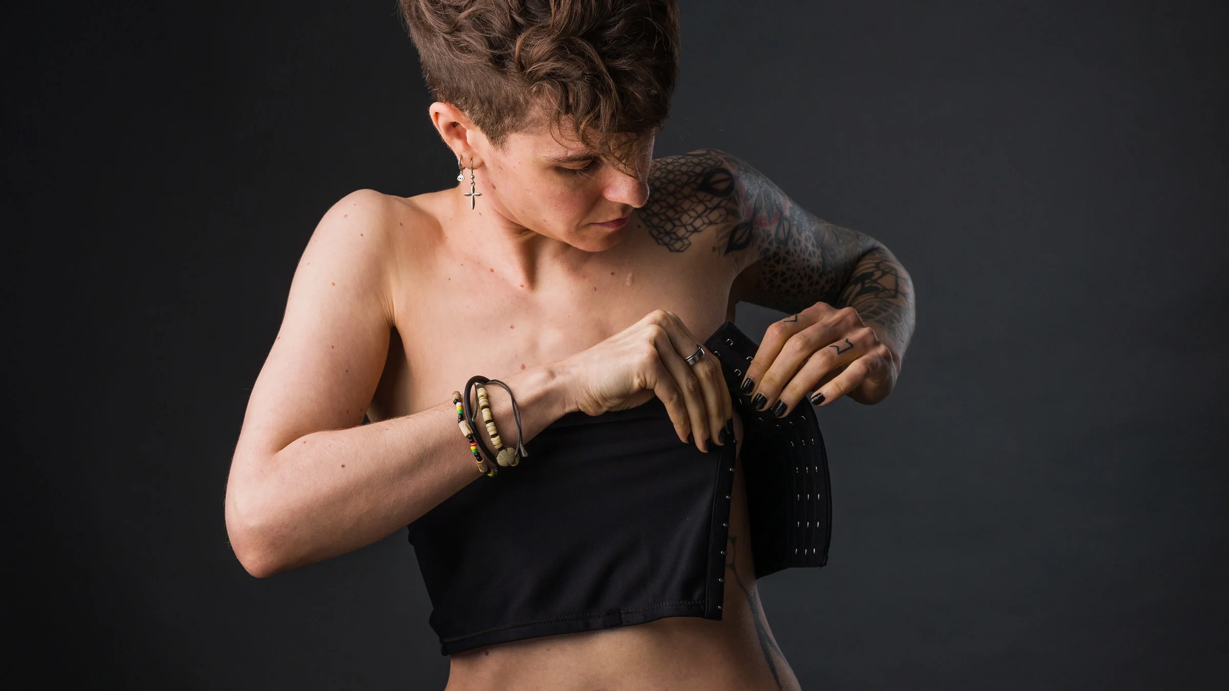 Someone wrapping a chest binder.