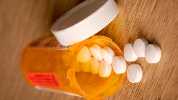 nifedipine: pill bottle with warning label 1361395239