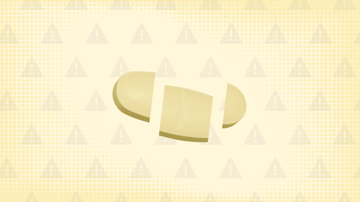 Light-yellow background with texture and warning sign pattern. In the center is an oblong yellow pill cut into thirds.
