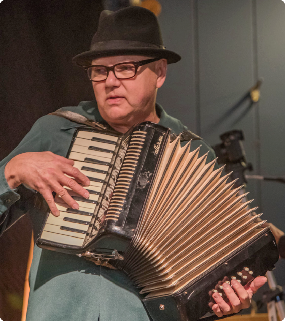 Musician Ricky Nye is pictured playing the accordion