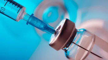 peptides: closeup syringe needle and vial 1154747097
