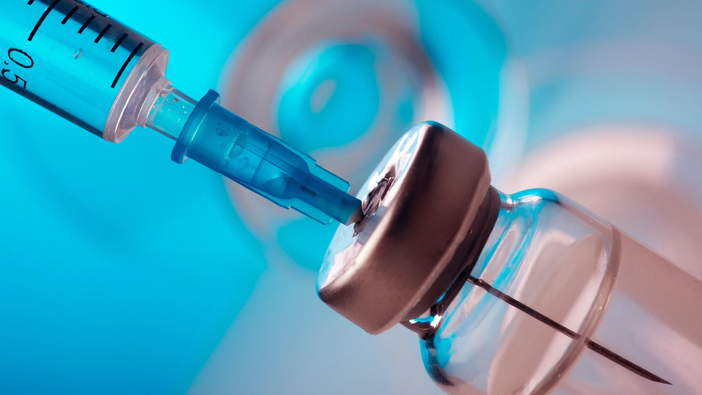 Close-up needle syringe and vial