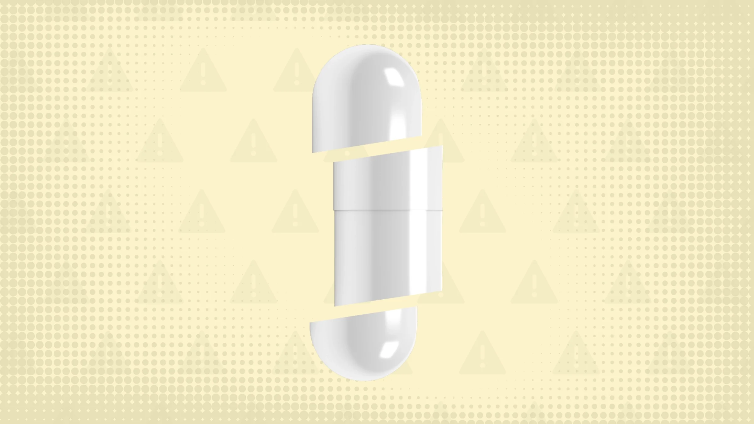 In the center of a yellow-ish background with texture and warning sign pattern is a white capsule pill cut into thirds.