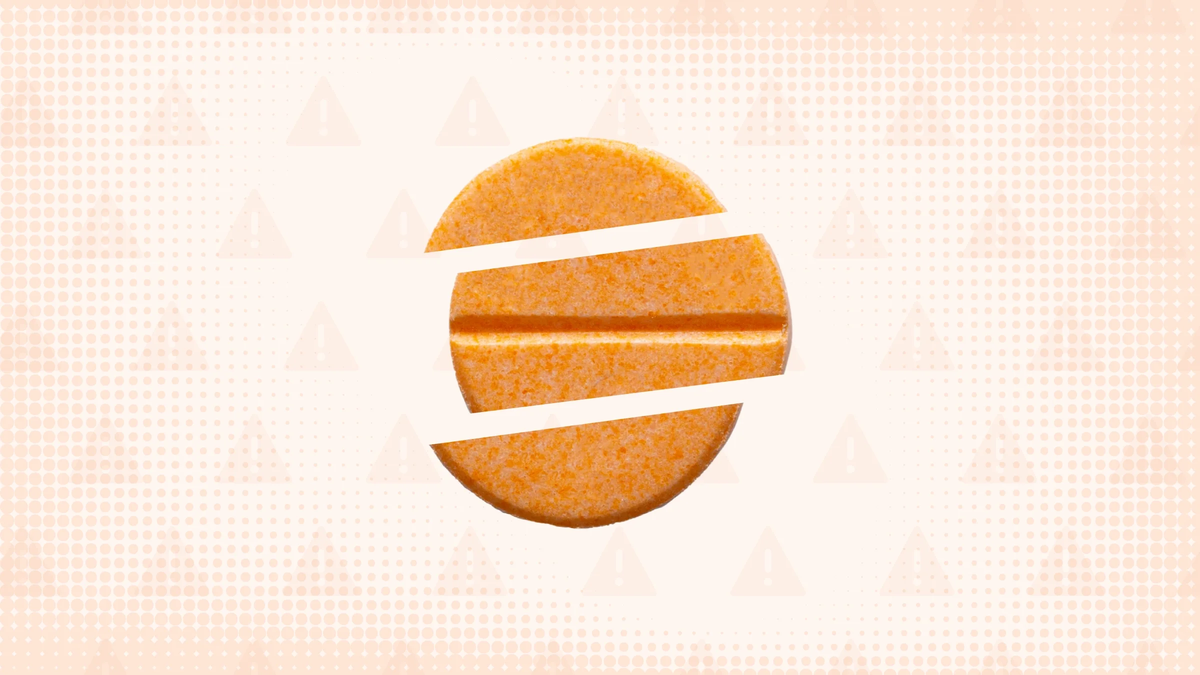 Light orange background with halftone texture and warning side pattern. In the center is a round orange pill cut into thirds.