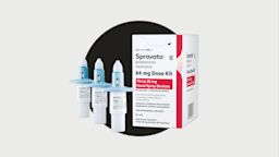 A Spravato box with three devices are pictured against a black background.
Courtesy of Johnson & Johnson