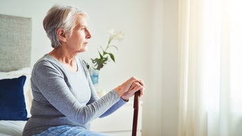Pancreatitis: senior woman staring out window 1315315110